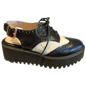 NEW ALL BLACK women's spectator 23 mules in black